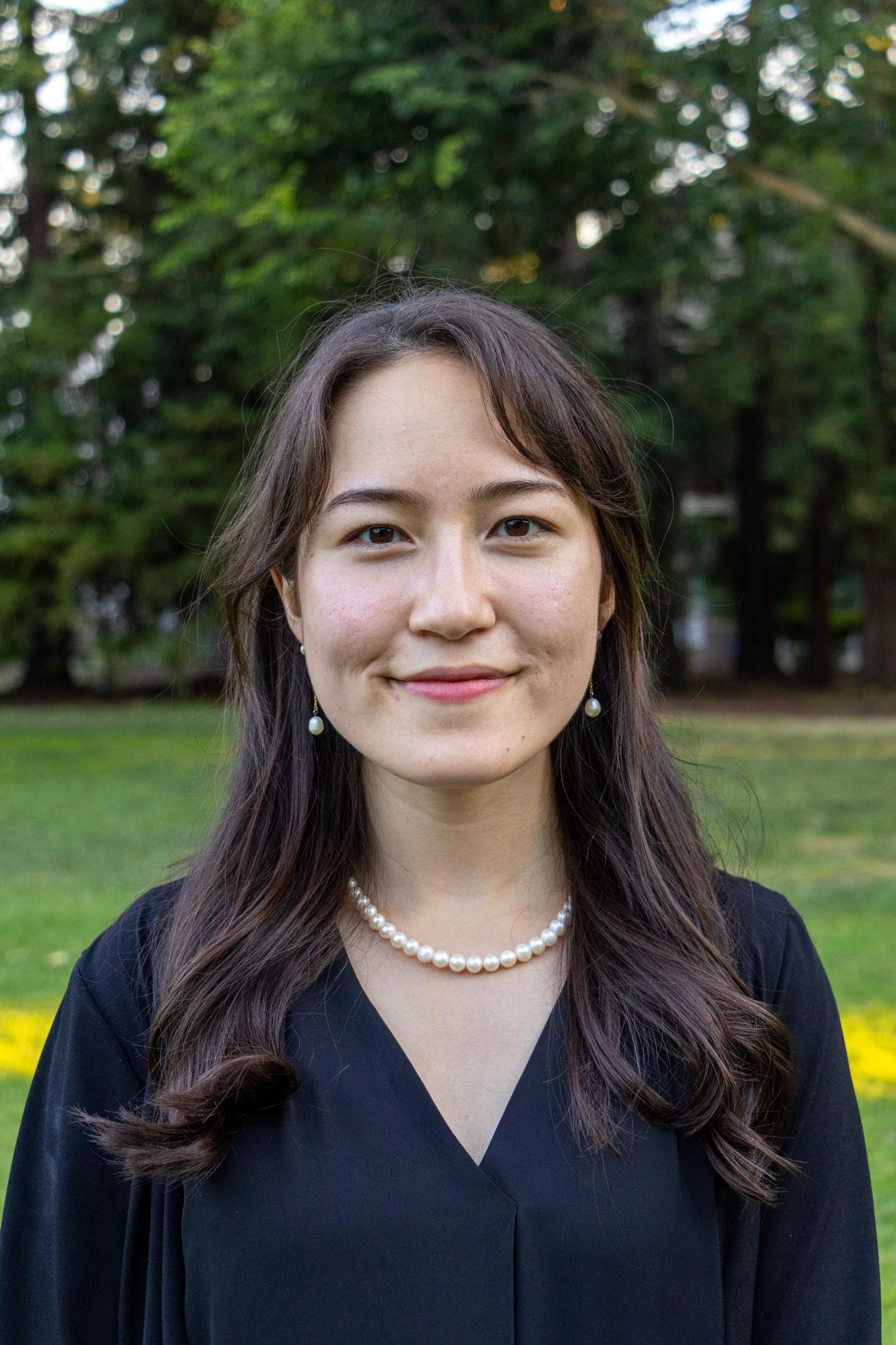 Professional headshot with a pearl necklace outdoors — Sacramento headshot photographer